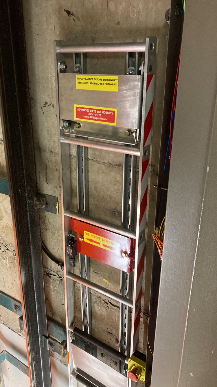 Retractable elevator pit ladder installed